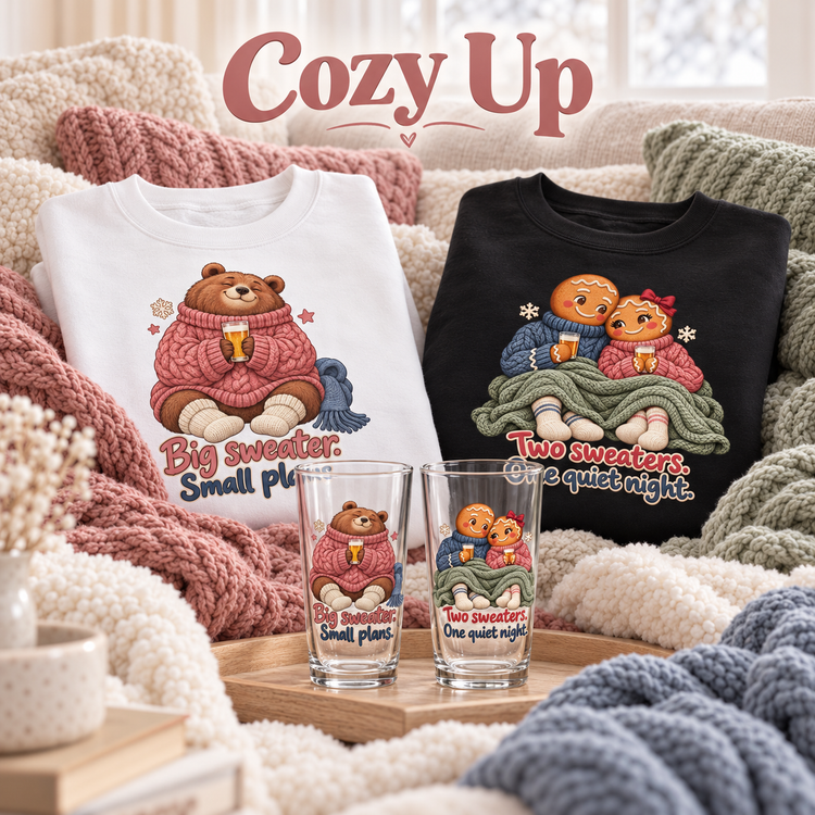 Cozy Up glasses and sweatshirts surrounded by soft rose, sage, cream and slate blankets