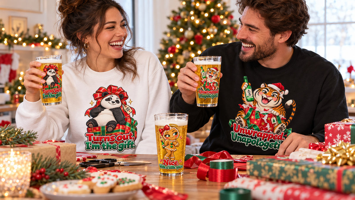 Adults in matching panda and tiger sweatshirts sharing somaek during holiday gift wrapping.